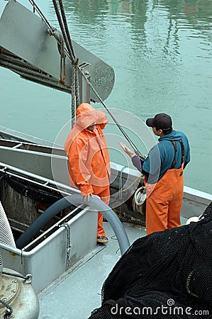 Two fishermen talking Stock Photo