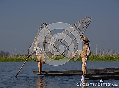 Two Fishermen Using Traditional Method of Inle Lake Editorial Stock Photo