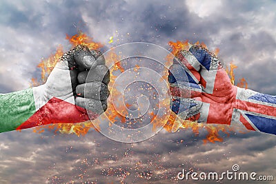 Two fist with the flag of Palestine and Great Britain faced at each other Stock Photo