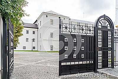 Two floors semi detached white country houses with front garden and white fence Stock Photo