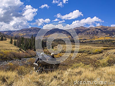 Two Fly fisherman taking in the view of the upper Rio Grande River Editorial Stock Photo