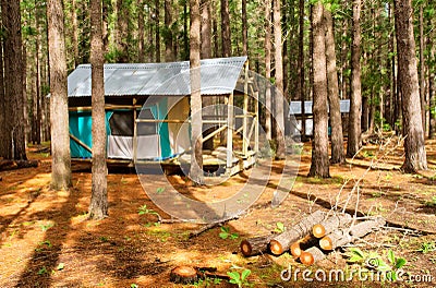 Two forest tent-houses after rain Stock Photo