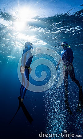 Two freedivers Stock Photo
