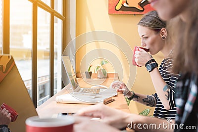 Two freelance working in coffee shop, Nomad worker conceptual, c Stock Photo