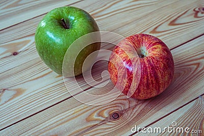 Two fresh apples. Red and green apples on the wooden background Stock Photo