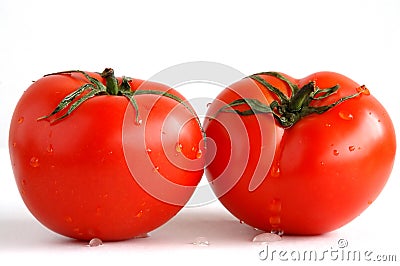 Two fresh and juicy tomatoes Stock Photo