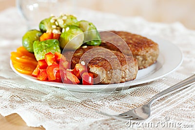 Two fried cutlets with broccol Stock Photo