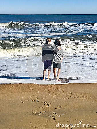 Friendship and Love on the Beach Stock Photo