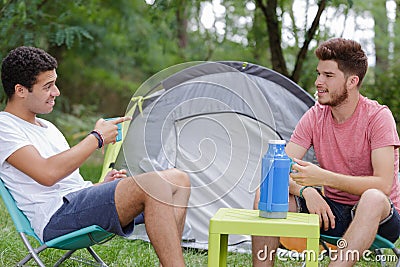 Two friends out camping Stock Photo
