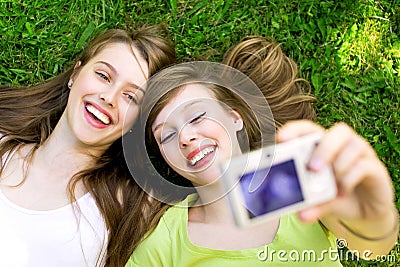 Two friends taking pictures Stock Photo