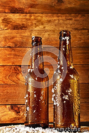 Two frosty beer bottles freshly taken out of the fridge Stock Photo