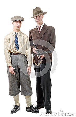 Two gangster in vintage clothing, with guns, Stock Photo