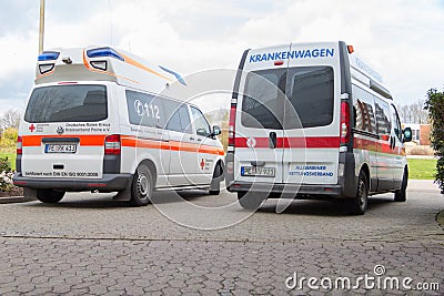 Two german ambulance vehicles stands on hospital Editorial Stock Photo