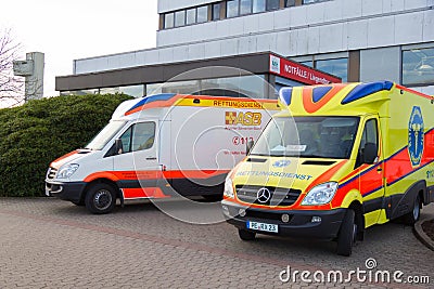 Two german ambulance vehicles stands on hospital Editorial Stock Photo