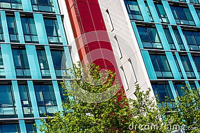 Two gigantic glass buildings adjoined together Stock Photo