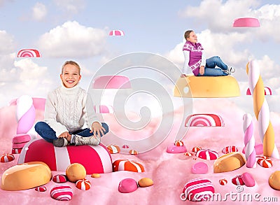 Two girls in a Candy land Stock Photo
