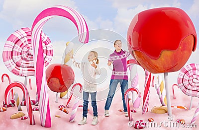 Two girls in a Candy land Stock Photo