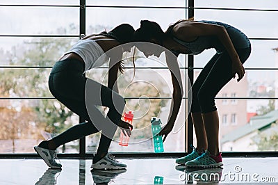 Two girls in the gym Stock Photo