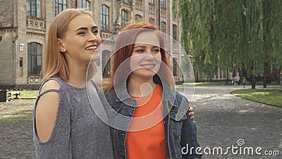 Two girls laughing and hugging Stock Photo