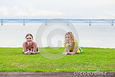 Two girls on the lawn Stock Photo