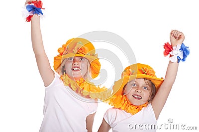 Two girls in orange cheer Stock Photo