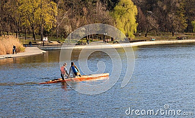 Two girls are riding a kayak Editorial Stock Photo