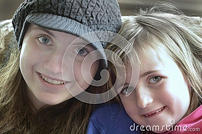 Two Girls Sisters Happy Smiling Faces Stock Photo