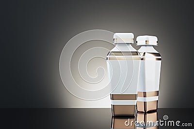 Two glass elegant perfume flacon on a gray background Stock Photo