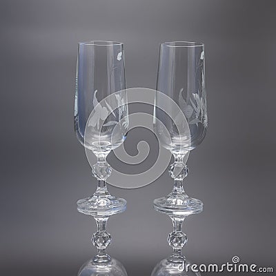 Two glass tall glasses for wine on a black background. Stock Photo