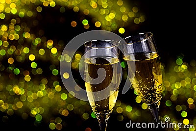 Two glasses of champagne with sparkling lights Stock Photo