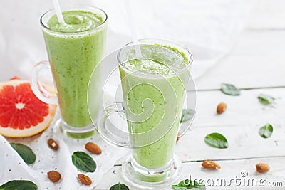 Green smoothie with spinach, grapefruit and almond milk Stock Photo