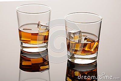 Two glasses of whiskey on the rocks Stock Photo