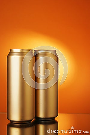 Two golden beer cans Stock Photo