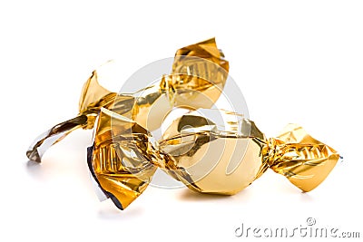 Two golden sweets Stock Photo