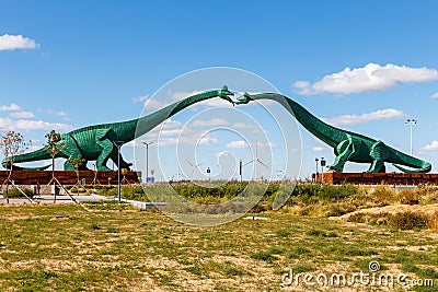 Two green kissing dinosaurs Editorial Stock Photo