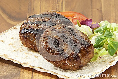 Two grilled burgers Stock Photo