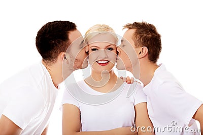 Two guys kissing friend woman cheeks