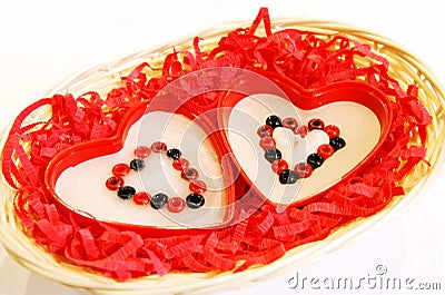 Two handmade heart-like candles Stock Photo