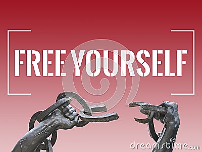 Two hands breaking chains with a white colored text `Free yourself` Stock Photo