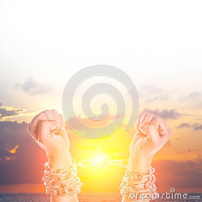 Two hands in chains Stock Photo