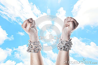 Two hands in chains Stock Photo