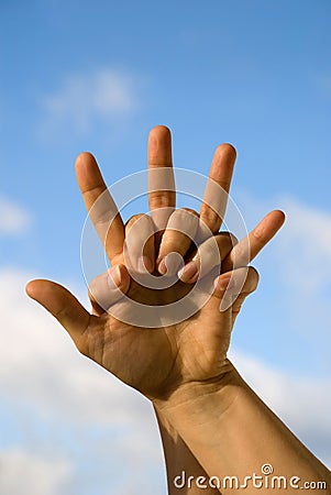 Two hands in front of the sky Stock Photo