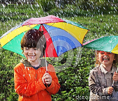 Two happy brother with umbrella Stock Photo
