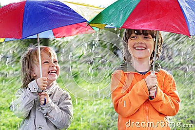 Two happy brother with umbrella Stock Photo