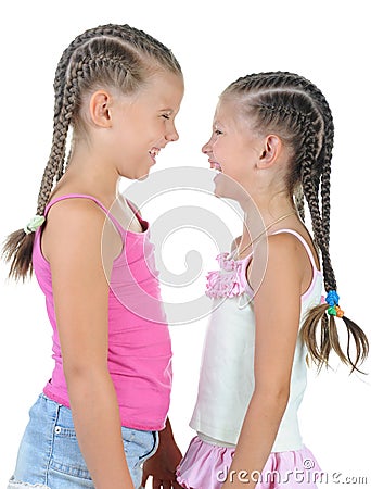 Two happy girl with pigtails. Stock Photo