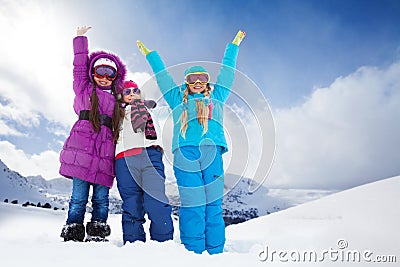 Two happy girls outside on winter day Stock Photo