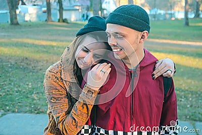 Two happy homeless man and woman Stock Photo