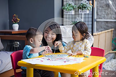 Asian kids painting and drawing Stock Photo