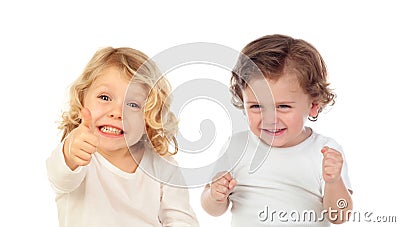 Two happy small children saying Ok and laughing Stock Photo