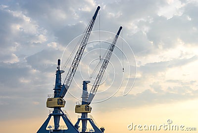 Two harbor cranes Stock Photo